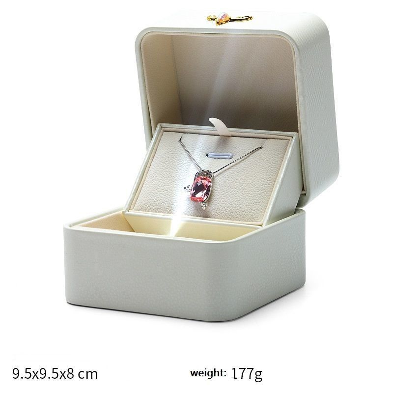 End Creativo Lampada a luce a LED Anello di fidanzamento Scatola di visualizzazione Anello singolo Pendente Gioielleria Scatola regalo Scatola di cuoio PU